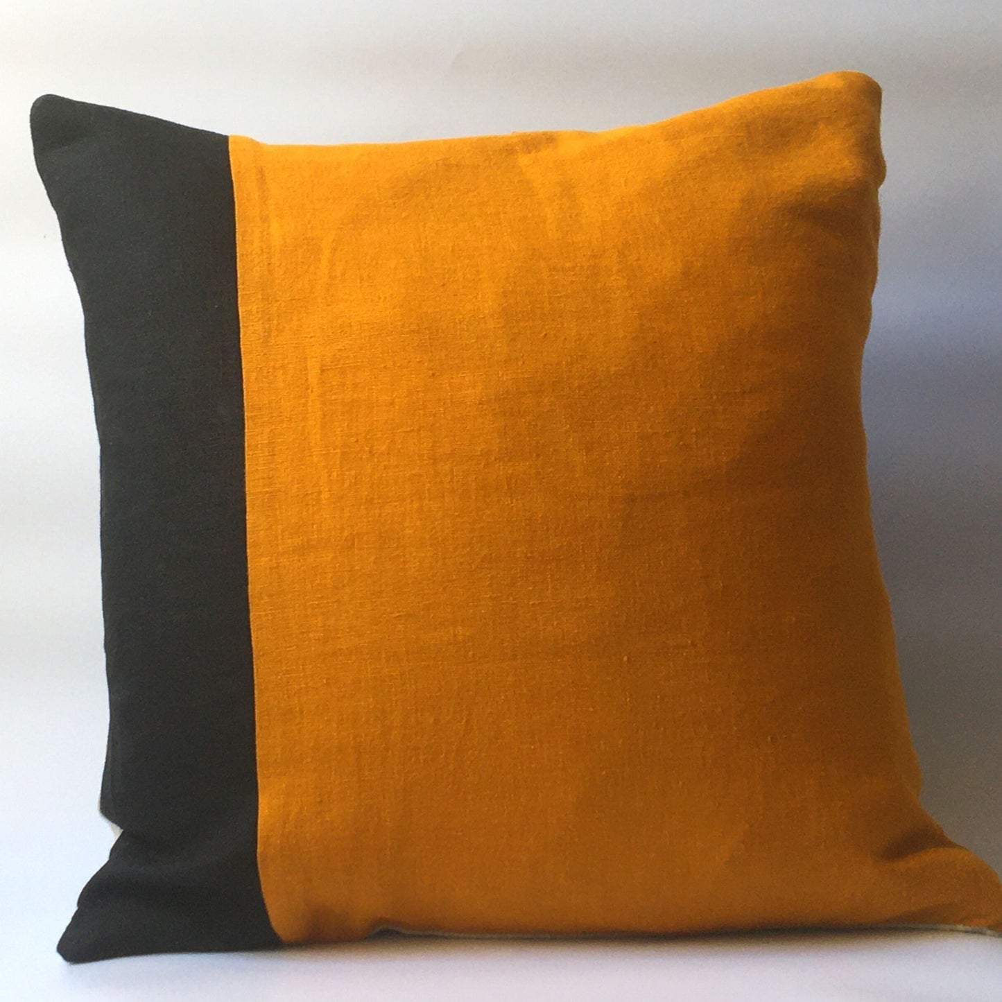 Colour block yellow and black cushion