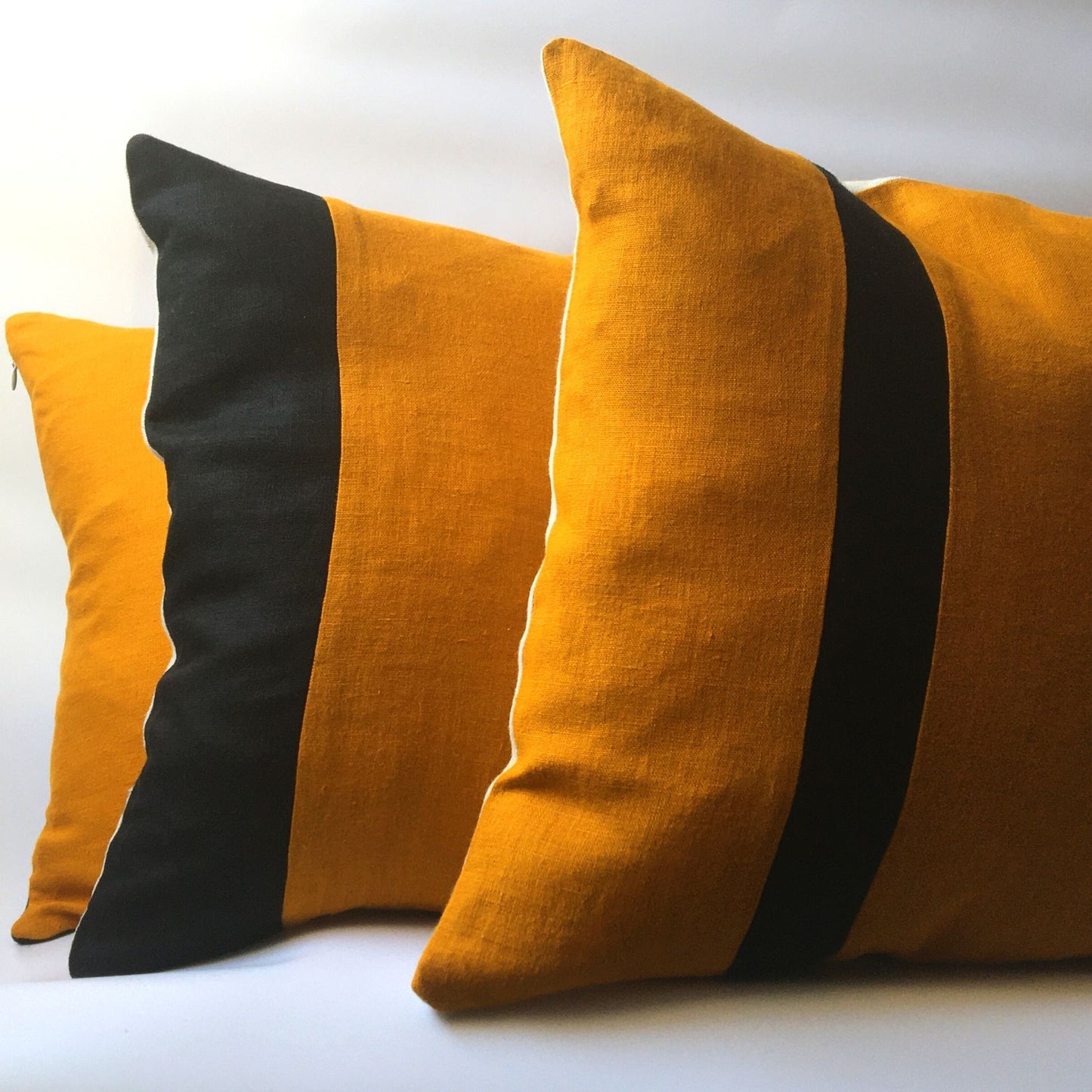 Bee cushion cover collection, three cushions stacked