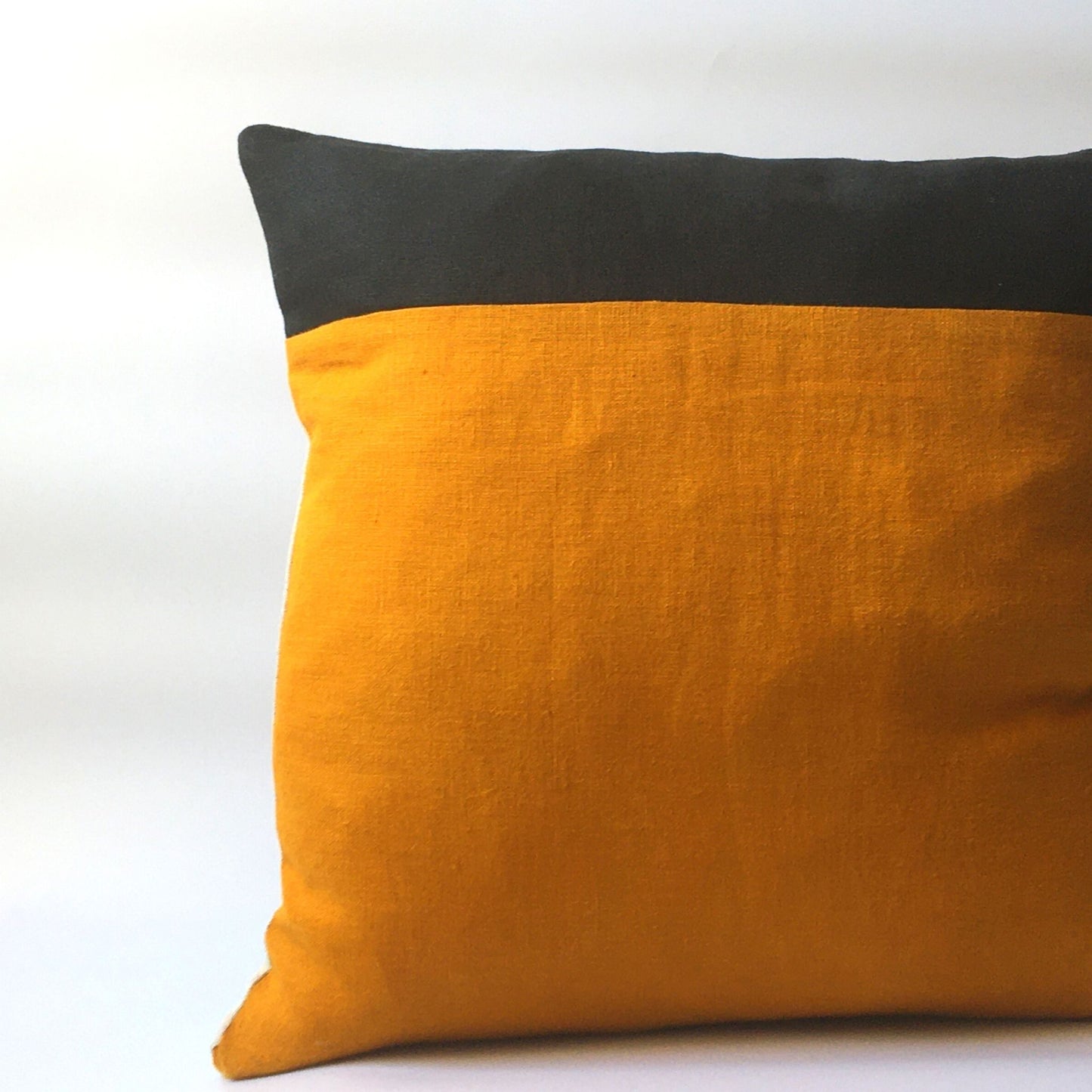 Colour block yellow and black cushion