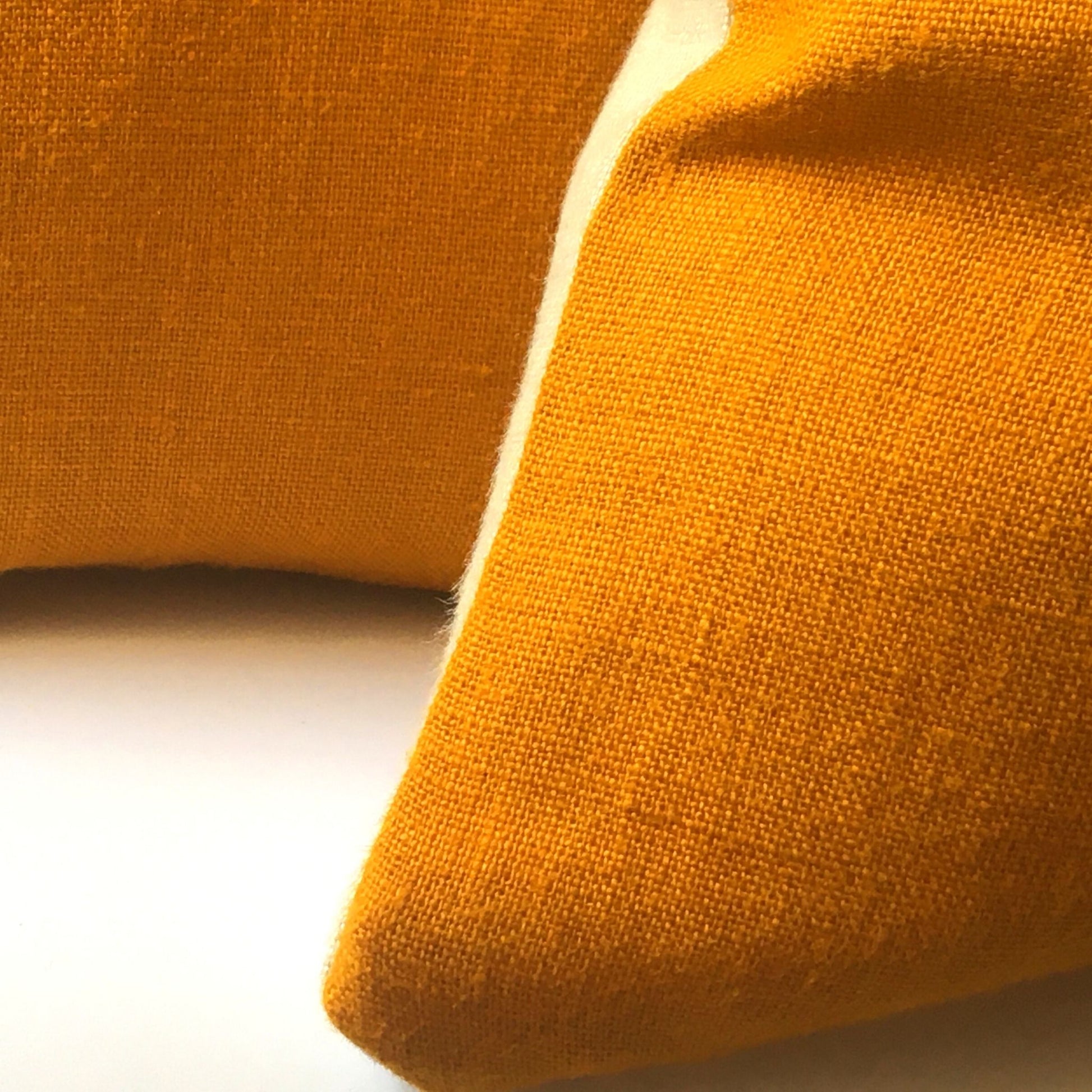 yellow cushion cover, neutral base details of corner