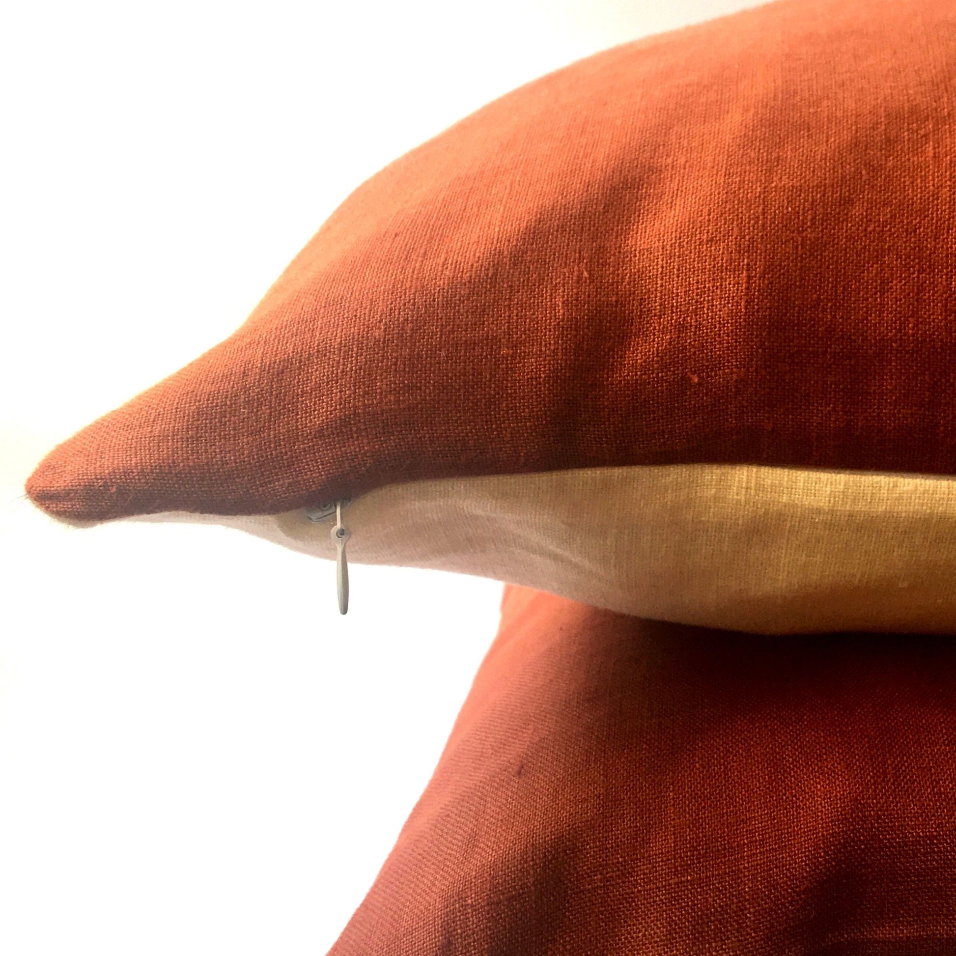 red squirrel cushion red front cream back zip closed